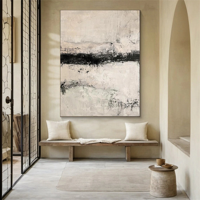 A hand-painted textured canvas in neutral wabi-sabi tones, shown as wall art above a sofa